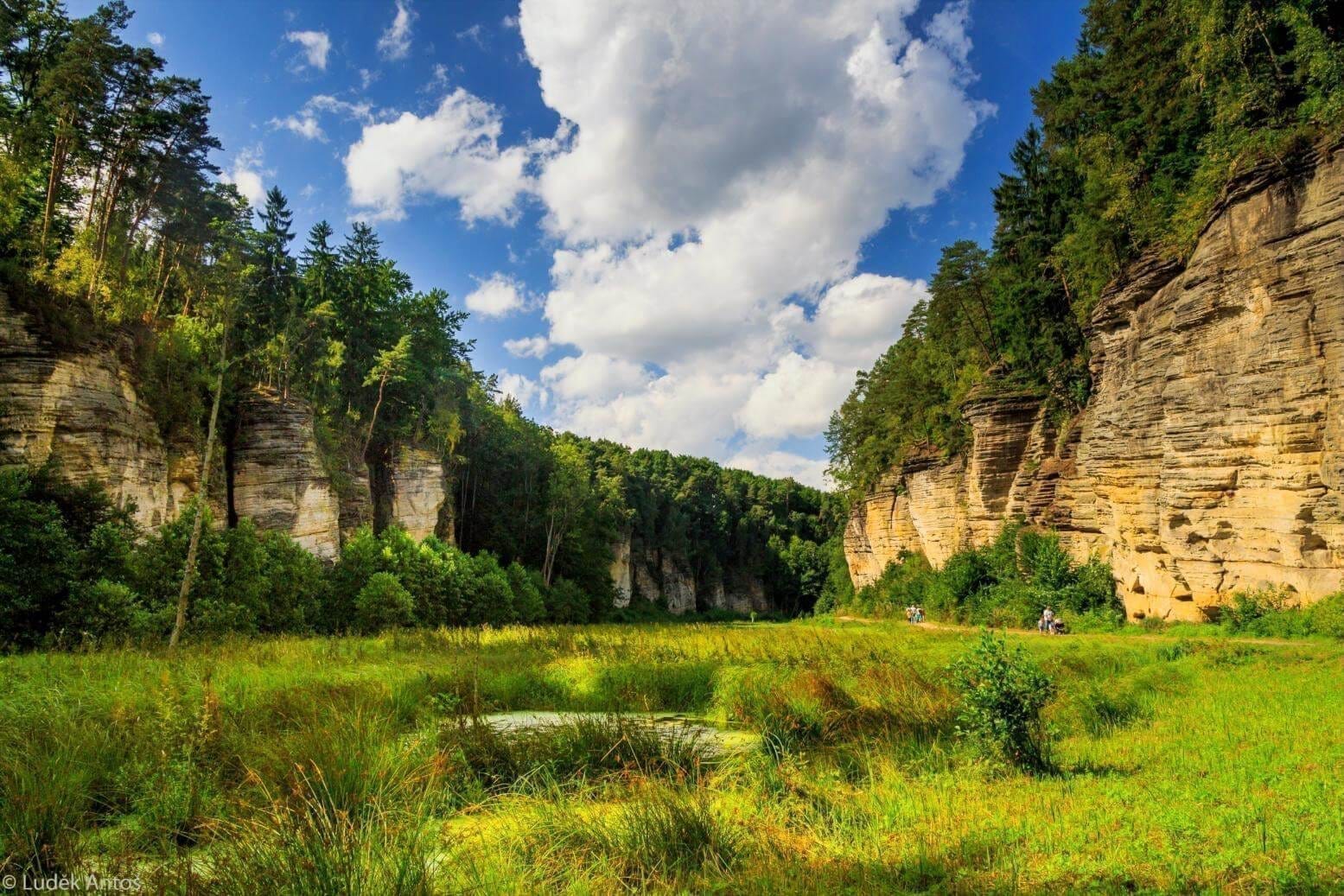 A view of Kost Castle nestled within the Plakánek valley in the Bohemian Paradise region.