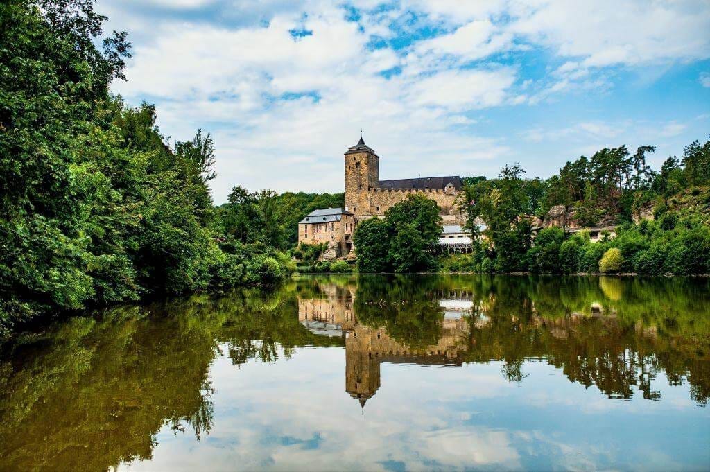 Kost Castle and one of its defensive ponds, showing how water and terrain protected the fortress.