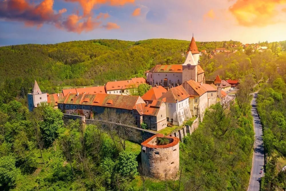 A final atmospheric view of Křivoklát Castle architecture and stone fortifications.