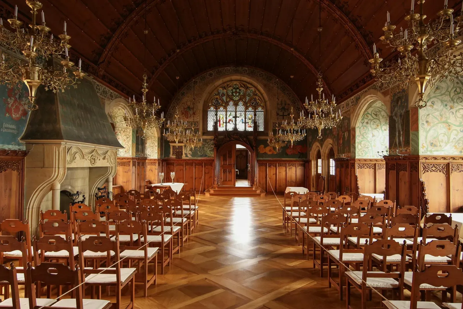 Explore the ornate interior of the Knights Hall in Bouzov Castle, Czech Republic.