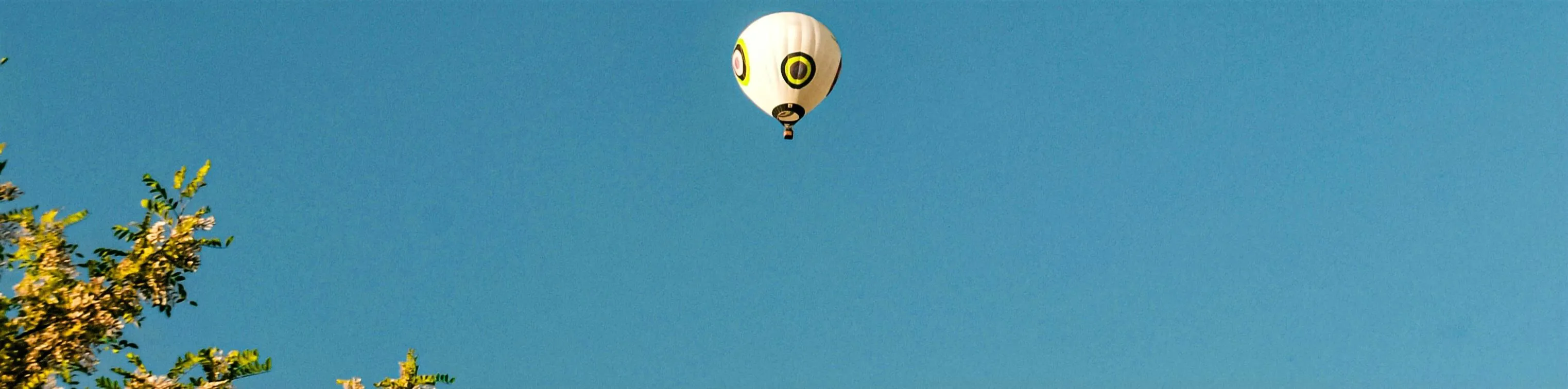 A person rock climbing a steep cliff, for adrenaline junkies.